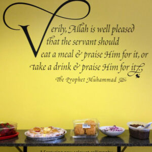 'Eat, Drink & Praise' decal in the Islamic Relief office.